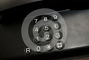 Black keypad on telephone