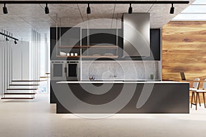 Black kitchen counter, wood and concrete