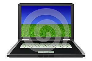Black laptop with grass and sky on screen