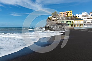 Black lava sand beach in Puerto Naos, La Palma, Canarian islands, Spain photo