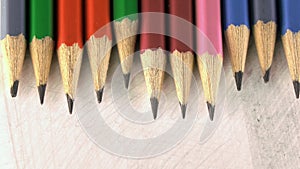 Black lead pencils lie in a row