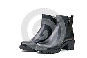 Black leather ankle boots for women made of leather isolated on a white background