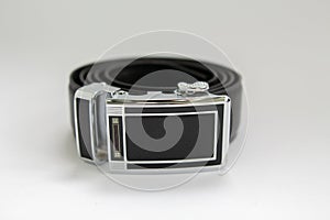 Black leather belt on a white background