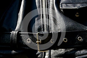 Black leather biker jacket belt zipper and pocket