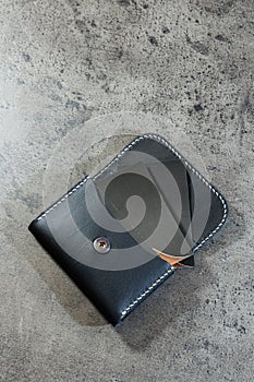 Black leather cardholder on a