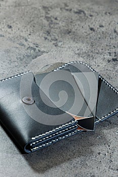 Black leather cardholder on a
