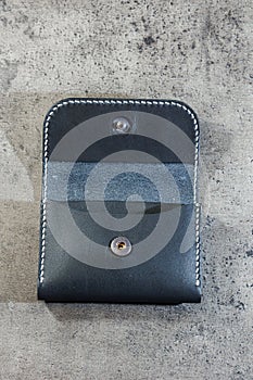Black leather cardholder on a
