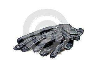 Black leather gloves on snow