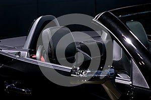 Black leather passenger seat in modern sport car