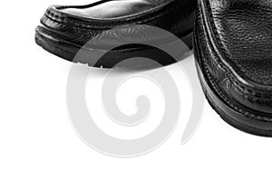 Black leather shoes isolated on white background