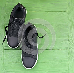 Black leather sneakers with laces