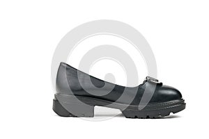 Black leather women`s shoe with a large heel isolated on a white background