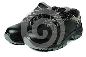 Black leather work safety boots isolated on white