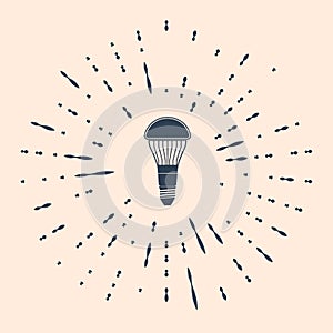 Black LED light bulb icon isolated on beige background. Economical LED illuminated lightbulb. Save energy lamp. Abstract