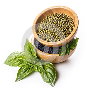 Black lentils and mash with basil in wooden bowls