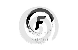 Black letter grunge circle F alphabet letter logo icon design template for company business