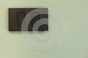 Light Switch on Concrete Wall