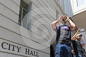 Black lives matter protestor shouting during march on City Hall