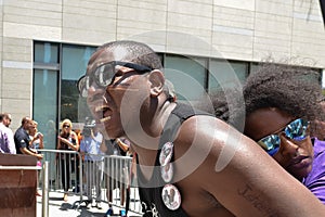 Black lives matter protestor shouting during march on City Hall