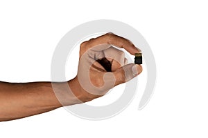 black male hand with micro SD memory card isolated