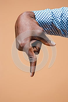 Black male hand point finger. Hand gestures - man pointing on virtual object with forefinger
