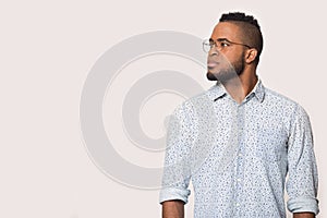 Black male isolated on grey background think of sale offer