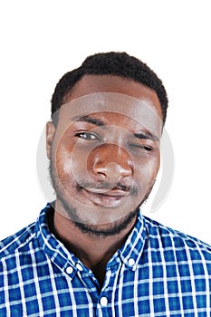 Black man blinking with his eye.