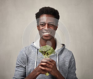 Black man with broccoli