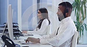 Black man, call center and computer with typing in office for email communication, tech support or telemarketing. Crm