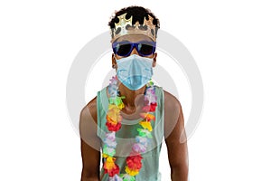 Black man in costume for carnival with pandemic mask isolated. African man in various poses and expressions