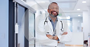 Black man, doctor with arms crossed and portrait, health and cardiovascular surgeon, pride with confidence. Medical