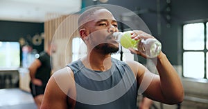 Black man, drinking water and fitness at club, healthy body and wellness after training. Bottle, thirsty and serious