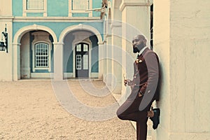 Black man in an elegant suit, street