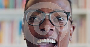 Black man, face glasses and laughing portrait in library, office bookshelf and Brazil of funny, comic and happiness