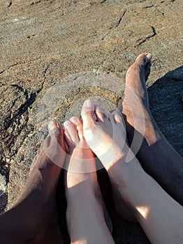 Black man feet and caucasian woman feet - Racial diversity
