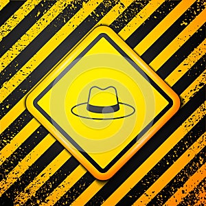 Black Man hat with ribbon icon isolated on yellow background. Warning sign. Vector