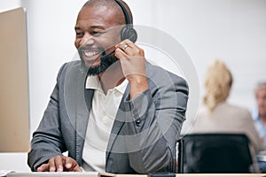 Black man, headphone and computer at call center for client support, customer service and telemarketing. Male person