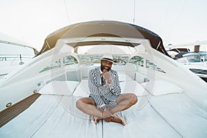 A black man on a luxury yacht
