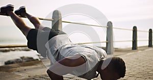 Black man, push up and exercise at the beach for fitness or training outdoor for challenge in workout goals. African