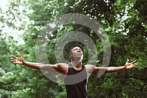 Black man in the rain