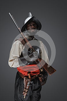 Black man soldier from reconstruction period with flintlock musket