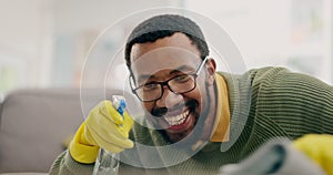 Black man, spray bottle and cleaning table in house living room for virus safety, bacteria and furniture dirt. Smile