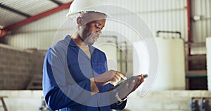 Black man, tablet and technician at warehouse for maintenance, inspection or research on site. African male person