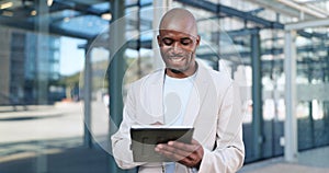 Black man, tablet and typing in city, commute and online, digital and technology. Working, cape town and busy in urban