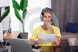 Black Man Wearing Yellow T-shirt at Remote Job