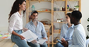 Black man worker giving high five to teammate on meeting