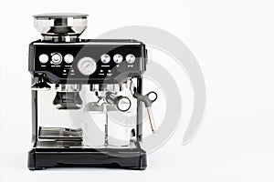 Black manual coffee maker with coffee mugs on a white background, front view