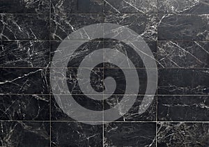 Black marble with white streaks. Wall or floor rectangle tiles.