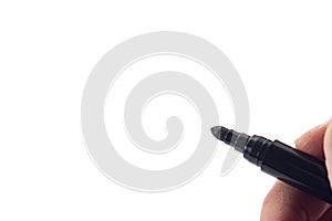 Black marker in hand isolated on white background