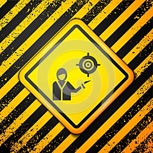 Black Marketing target strategy concept icon isolated on yellow background. Aim with people sign. Warning sign. Vector